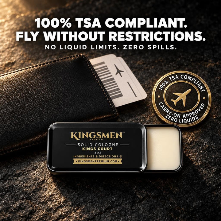 Kingsmen solid cologne in a black metal tin with a cream-colored solid stick, displayed on a dark textured surface next to a black leather wallet, a boarding pass, and a gold TSA-compliant seal. Text at the top reads & - Thumbnail