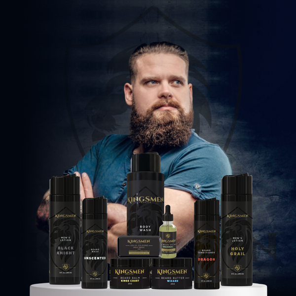 Man with a beard surrounded by Kingsmen Premium grooming products on a dark background
