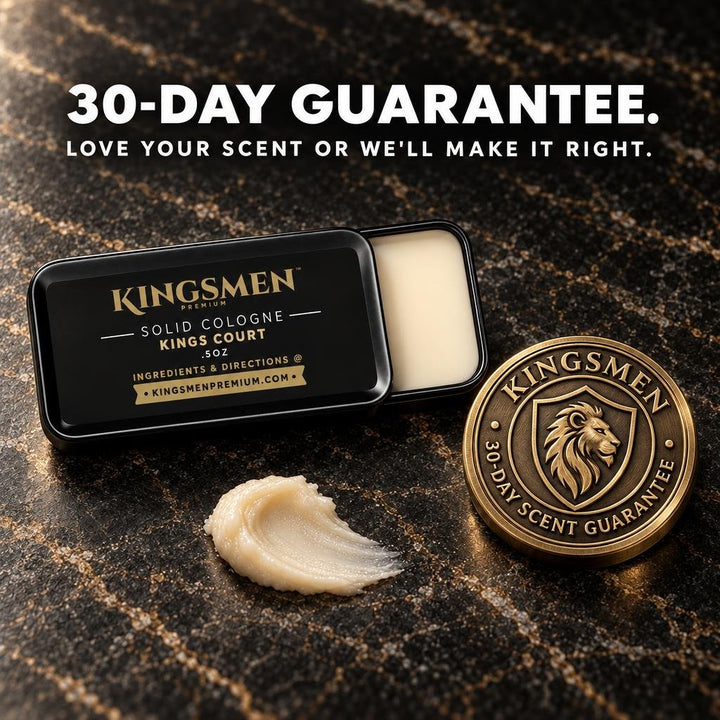 Open Kingsmen solid cologne tin and a dollop of balm on black and gold marble next to a gold coin stamped with the Kingsmen lion-head shield crest and the words 30-Day Scent Guarantee. Headline reads: 30-day guarantee. Love your scent or we& - Thumbnail
